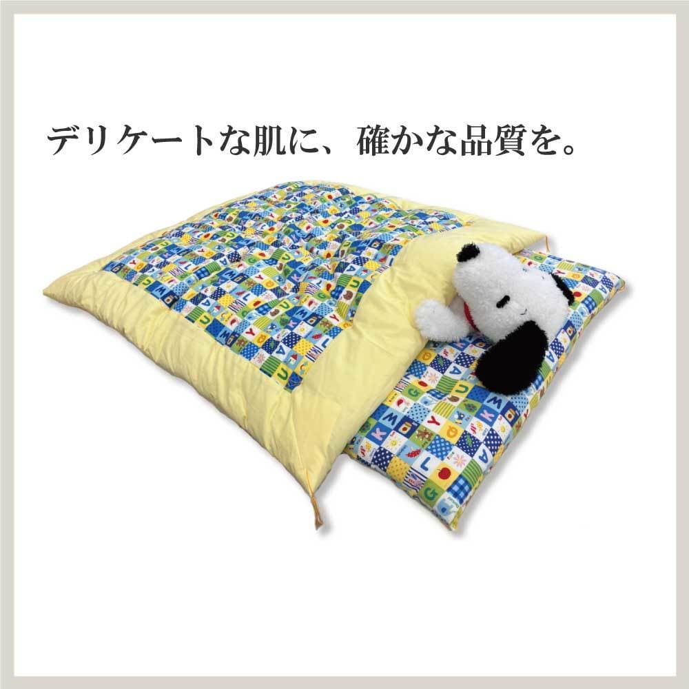 キクチシングが厳選する綿100％・日本製のベビー布団。寝返りも安心な幅広90cmサイズで、赤ちゃんのデリケートな肌にも優しい高品質な寝具の画像。